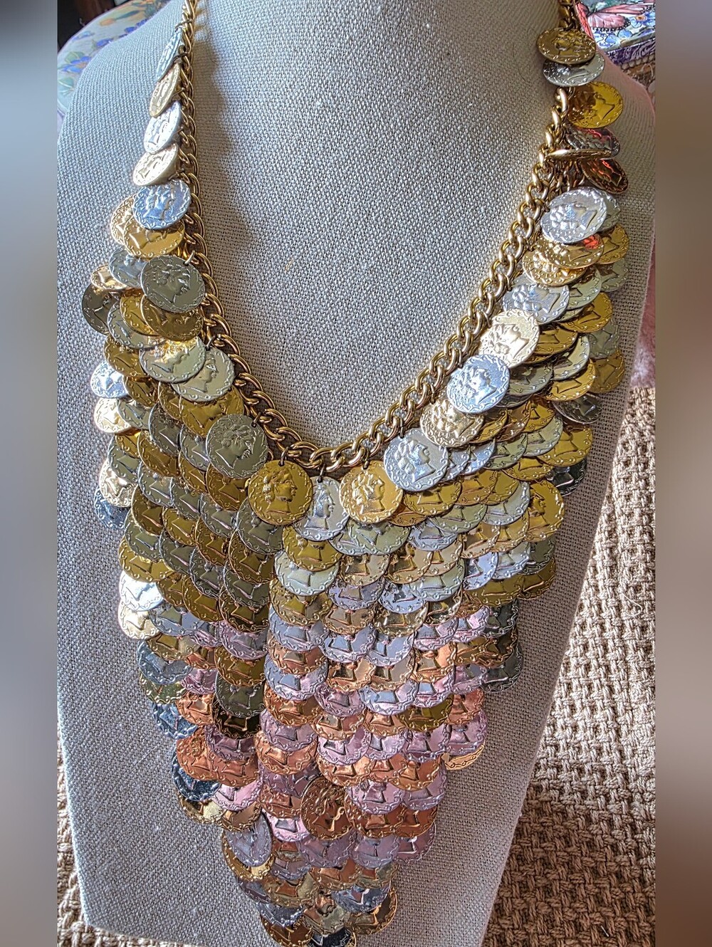 Vintage necklace featuring a cascading fringe of layered silver & gold Coins.